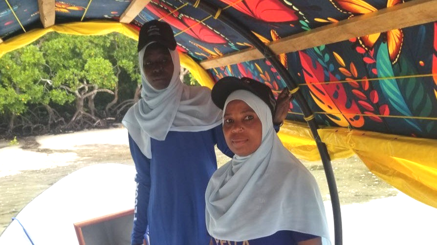 The two rangers, Asha Juma (left) and Asha Bakar (right), during one of the sea patrols in the North Pemba Channel Conservation Area.